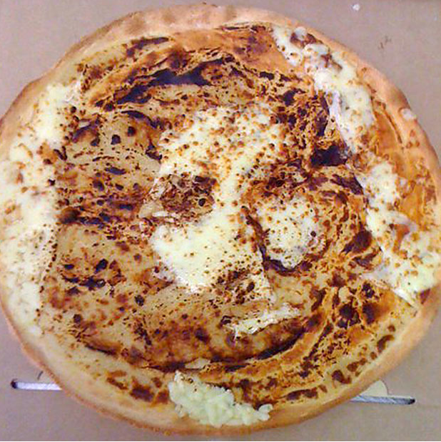 cheese pizza jesus. in a three cheese pizza.